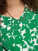 Gretha Curve Green Printed V-Neck Top